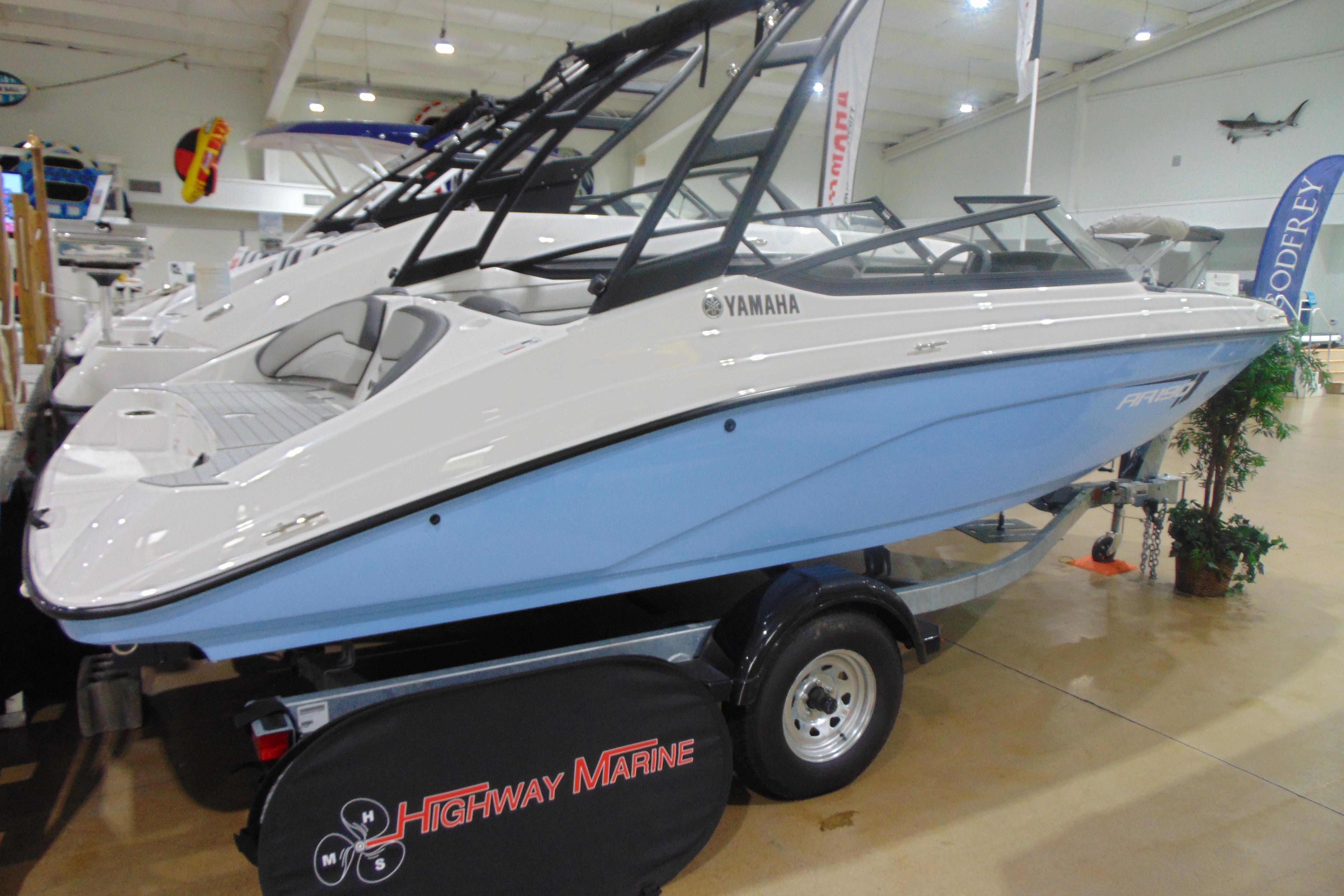 Yamaha Boats AR190 2025 Yamaha Boats AR190 displayed indoors on a trailer at a marine showroom.