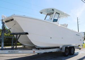 World Cat 260 CC-X 2025 World Cat 260 CC-X boat on trailer, side view.