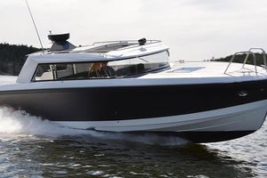 Dahl P10 2019 Dahl P10 boat cruising on water, showcasing sleek design and performance.