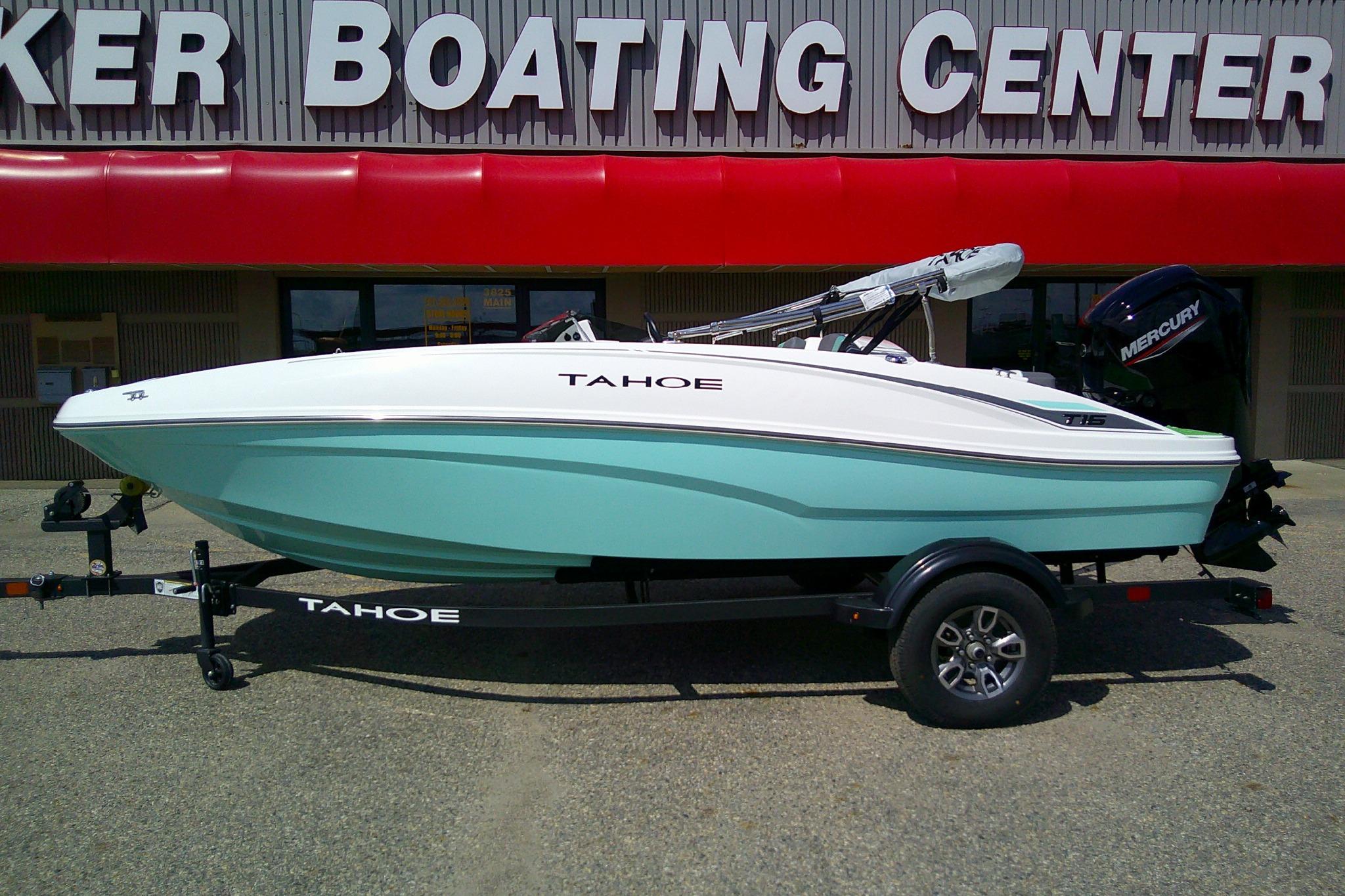 Tahoe T16 2025 Tahoe T16 boat on trailer outside a boating center.