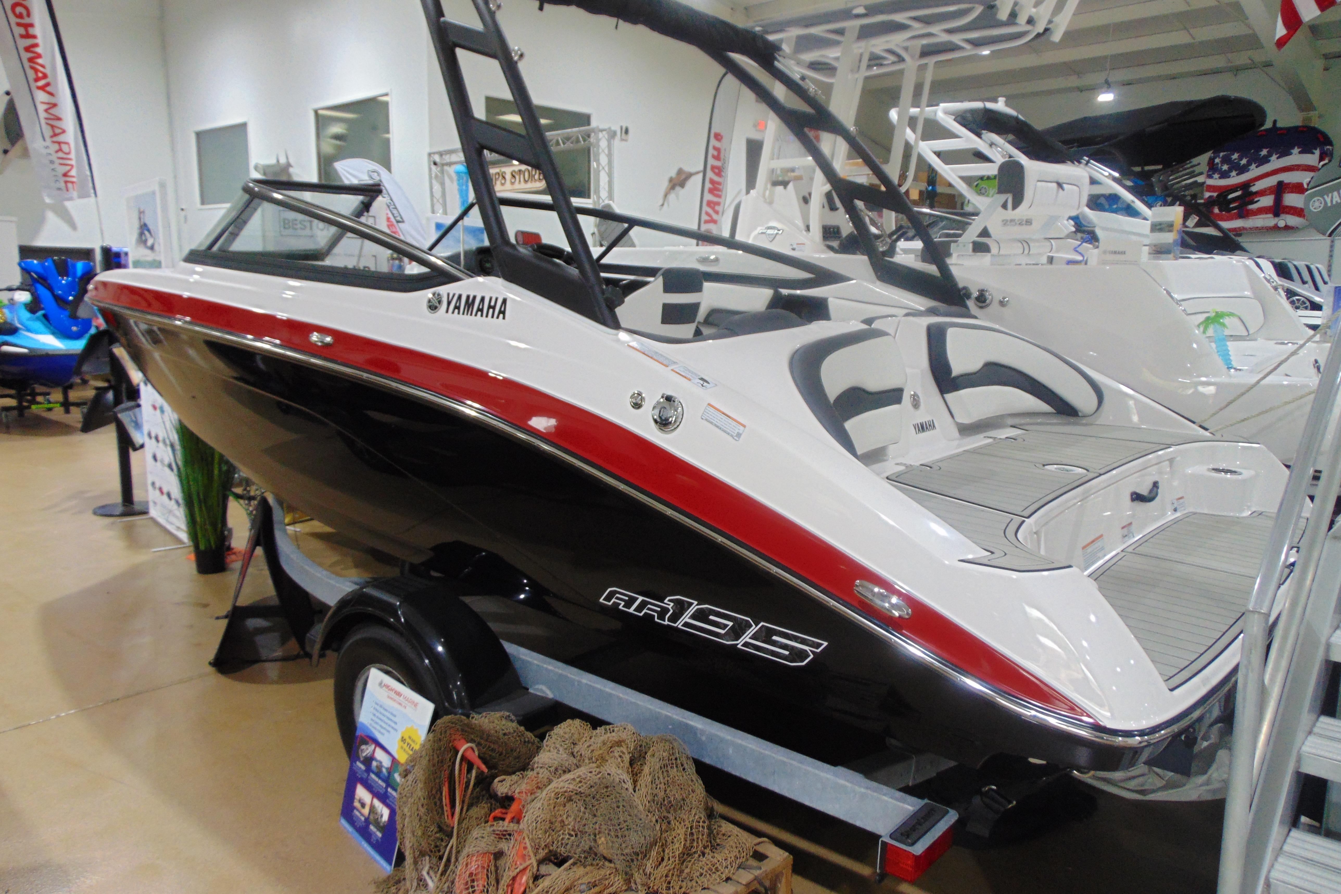 Yamaha Boats AR195 2025 Yamaha Boats AR195 displayed indoors, featuring sleek design and modern amenities.