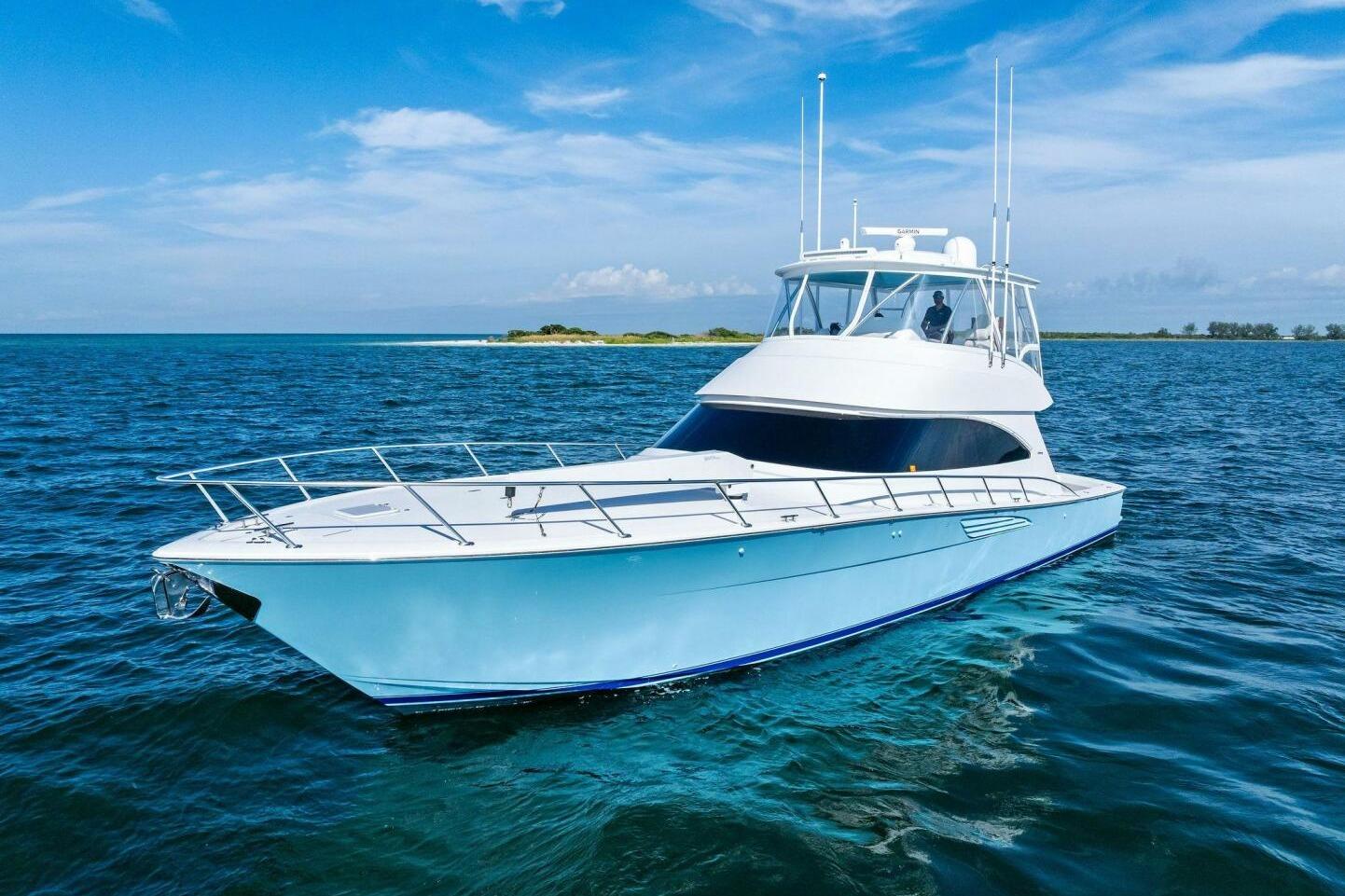 Viking 58 Convertible 2025 Viking 58 Convertible yacht cruising on open blue waters.