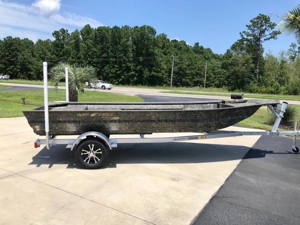 War Eagle 754LDV 2026 War Eagle 754LDV boat on trailer, parked outdoors on a sunny day.