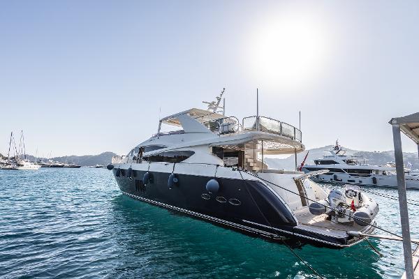 Princess 85 Motor Yacht Luxurious 2010 Princess 85 Motor Yacht docked in sunny marina.