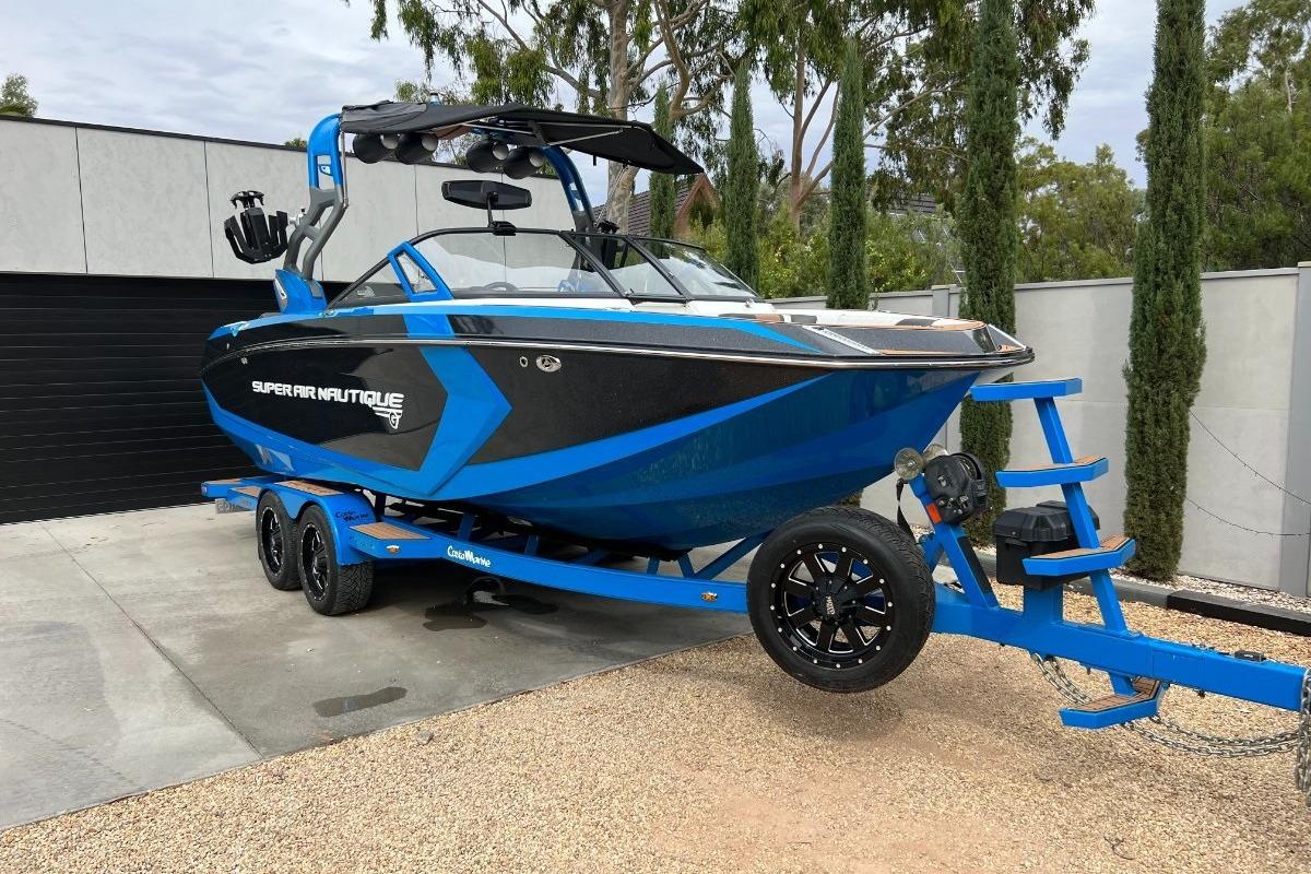 Nautique Super Air Nautique G23 2018 Nautique Super Air Nautique G23 boat on trailer, blue and black design.