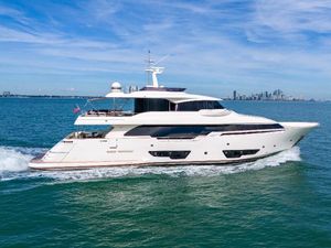 Custom Line Navetta 28 Luxurious 2015 Custom Line Navetta 28 yacht cruising on open water.