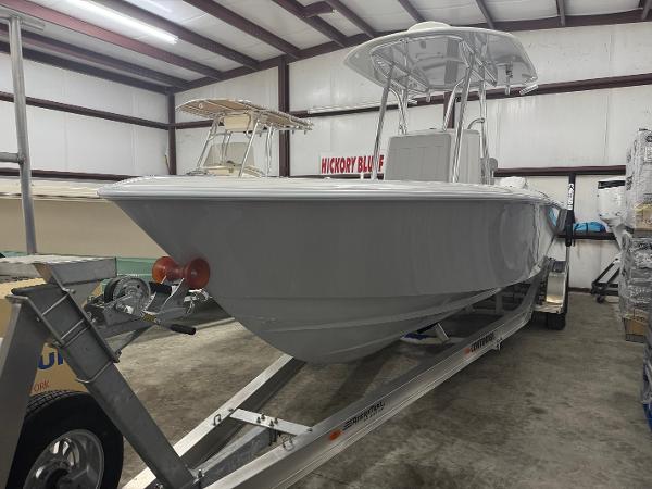 Contender 25 Tournament 2025 Contender 25 Tournament boat on trailer in indoor storage facility.