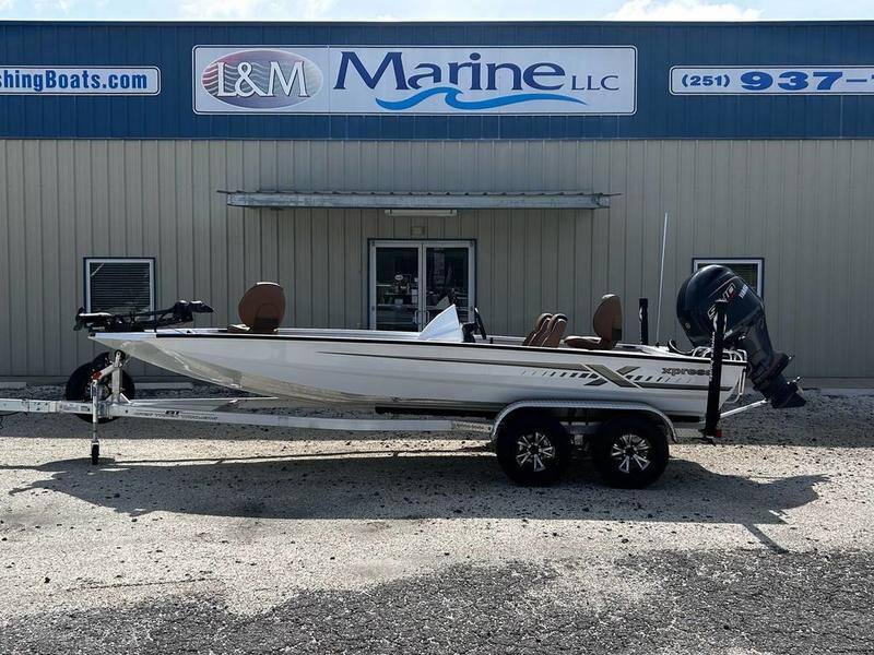Xpress H20C Crappie 2026 Xpress H20C Crappie boat on trailer outside L&M Marine dealership.