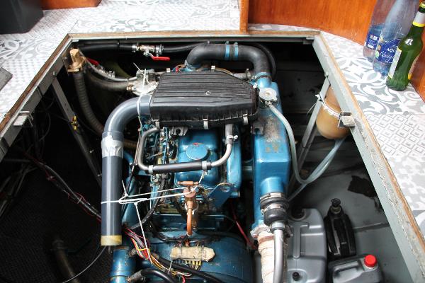 Pedro 10.50 Engine compartment of a 1992 Pedro 10.50 boat, showcasing mechanical components and wiring.