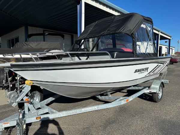 Smoker Craft Osprey 172 2025 Smoker Craft Osprey 172 boat on trailer, parked outdoors.