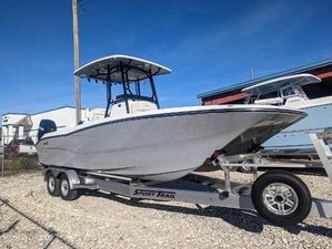 Sea Cat 262 2023 Sea Cat 262 boat on a Sport Trail trailer, parked outdoors.