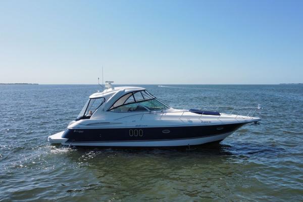 Cruisers Yachts 420 Express 2007 Cruisers Yachts 420 Express on open water under clear blue sky.