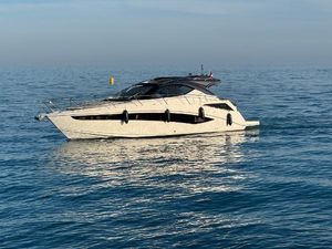 Galeon 405 HTL 2016 Galeon 405 HTL yacht cruising on calm blue waters.