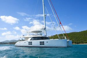 Sunreef 60 LOFT Luxury Sunreef 60 LOFT catamaran sailing on clear blue waters, 2016 model.