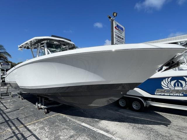 Wellcraft 352 Fisherman 2023 Wellcraft 352 Fisherman boat displayed outdoors on a trailer under a clear blue sky.