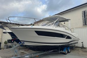 Jeanneau Cap Camarat 9.0 WA 2020 Jeanneau Cap Camarat 9.0 WA boat on trailer, parked outdoors.