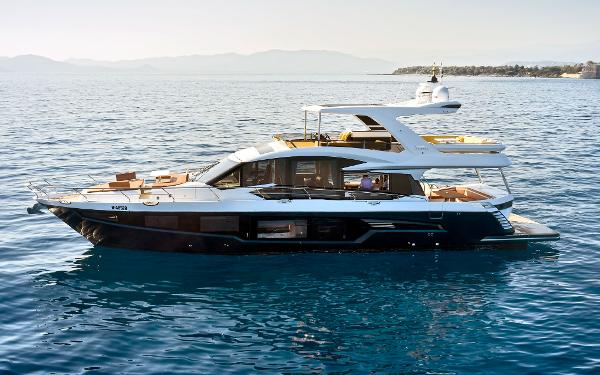 Galeon 680 Fly 2023 Galeon 680 Fly luxury yacht cruising on calm waters.