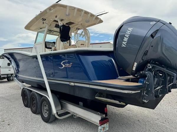 Scout 350 LXF 2017 Scout 350 LXF boat on trailer with Yamaha outboard motor.