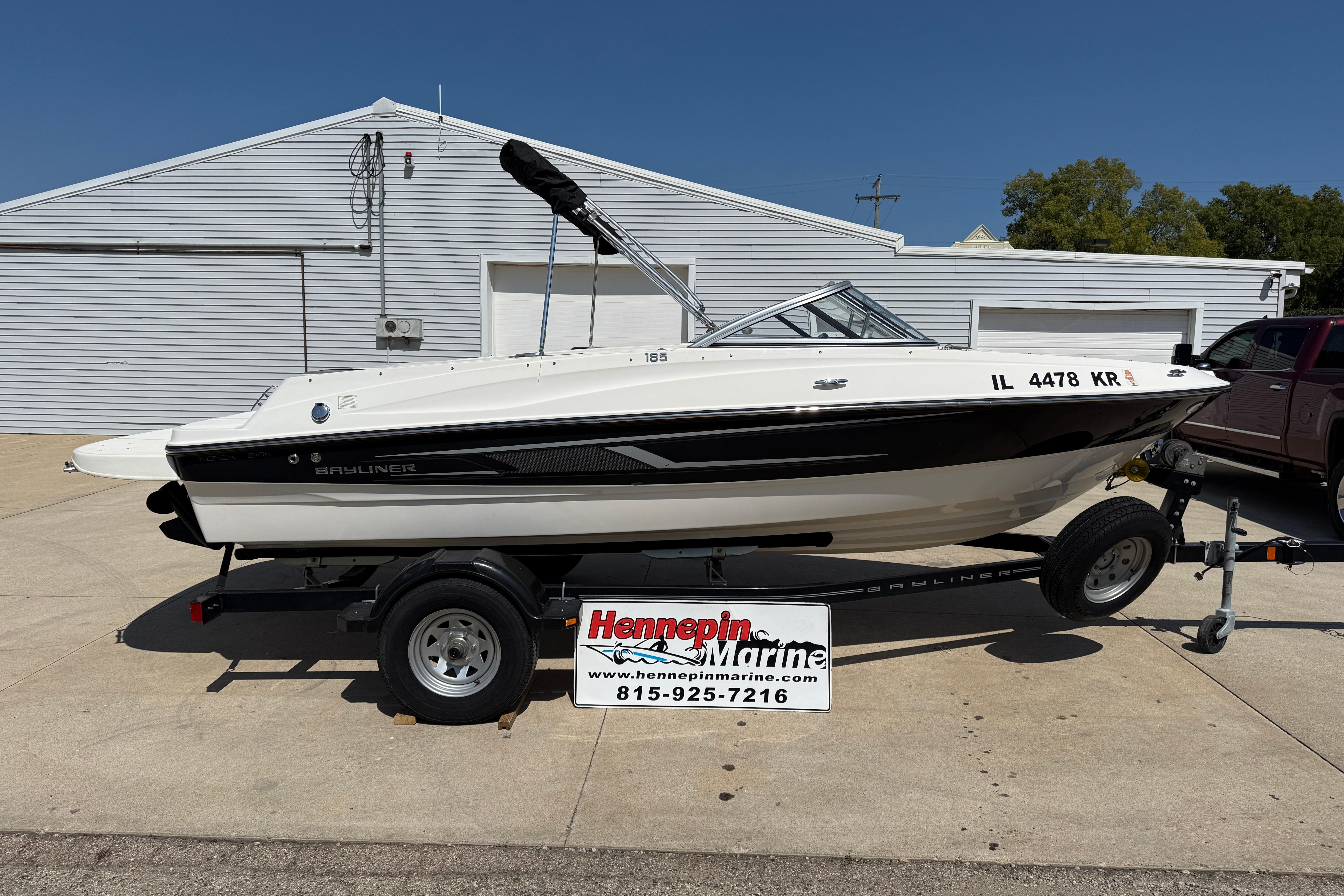 Bayliner 185 Bowrider 2014 Bayliner 185 Bowrider boat on trailer at Hennepin Marine dealership.