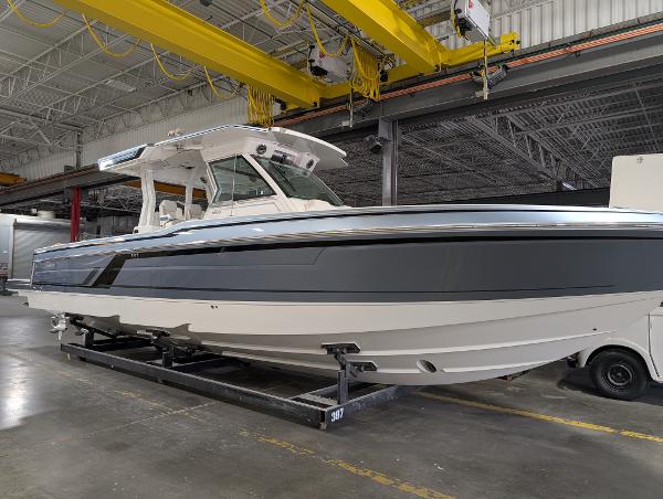 Formula 387 Center Console Fish 2025 Formula 387 Center Console Fish boat in a warehouse setting.