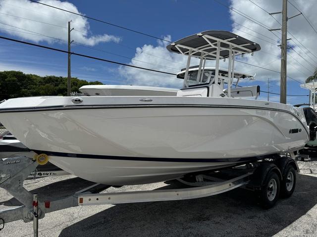 Yamaha Boats 220 FSH Sport 2024 Yamaha Boats 220 FSH Sport on trailer, white hull, clear sky background.
