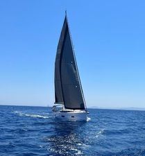 Bavaria C50 STYLE - OWNERS VERSION Sailing yacht Bavaria C50 STYLE 2022 on open sea under clear blue sky.