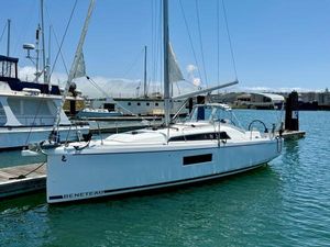 Beneteau Oceanis 30.1 2024 Beneteau Oceanis 30.1 sailboat docked in a marina under clear blue skies.