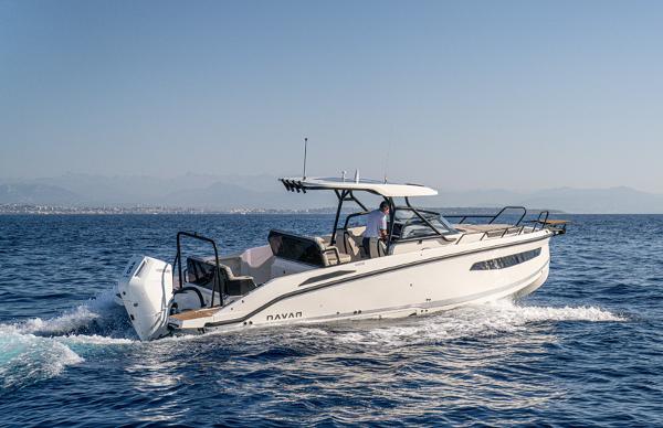 Navan S30 Navan S30 2025 boat cruising on open water under clear blue sky.