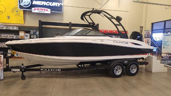 Tahoe 210 S 2024 Tahoe 210 S boat on display in showroom.