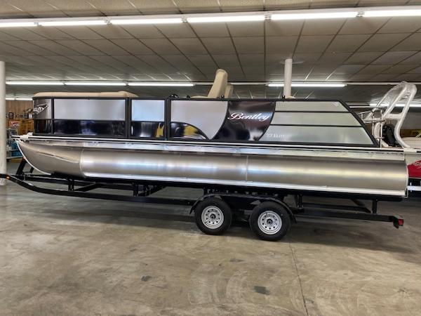 Bentley Pontoons 223 Elite Swing Back 2024 Bentley Pontoons 223 Elite Swing Back on trailer in showroom.