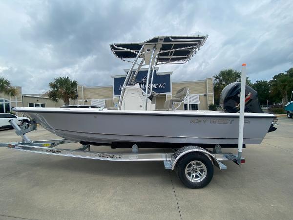 Key West 210 Bay Reef 2024 Key West 210 Bay Reef boat on trailer, parked outdoors.