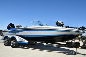 Ranger 212LS Reata 2024 Ranger 212LS Reata boat on trailer, blue and silver design, clear sky background.