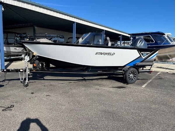 Starweld Victory 20 DC 2025 Starweld Victory 20 DC boat on trailer in parking lot.