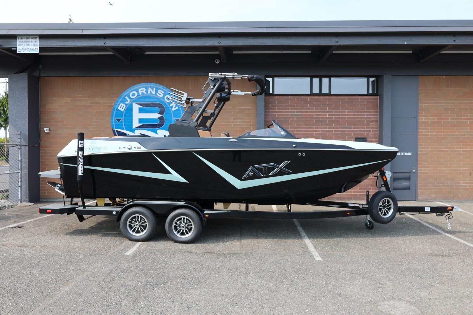 ATX Surf Boats 22 Type-S 2026 ATX Surf Boats 22 Type-S on trailer, parked outside Bjornson building.