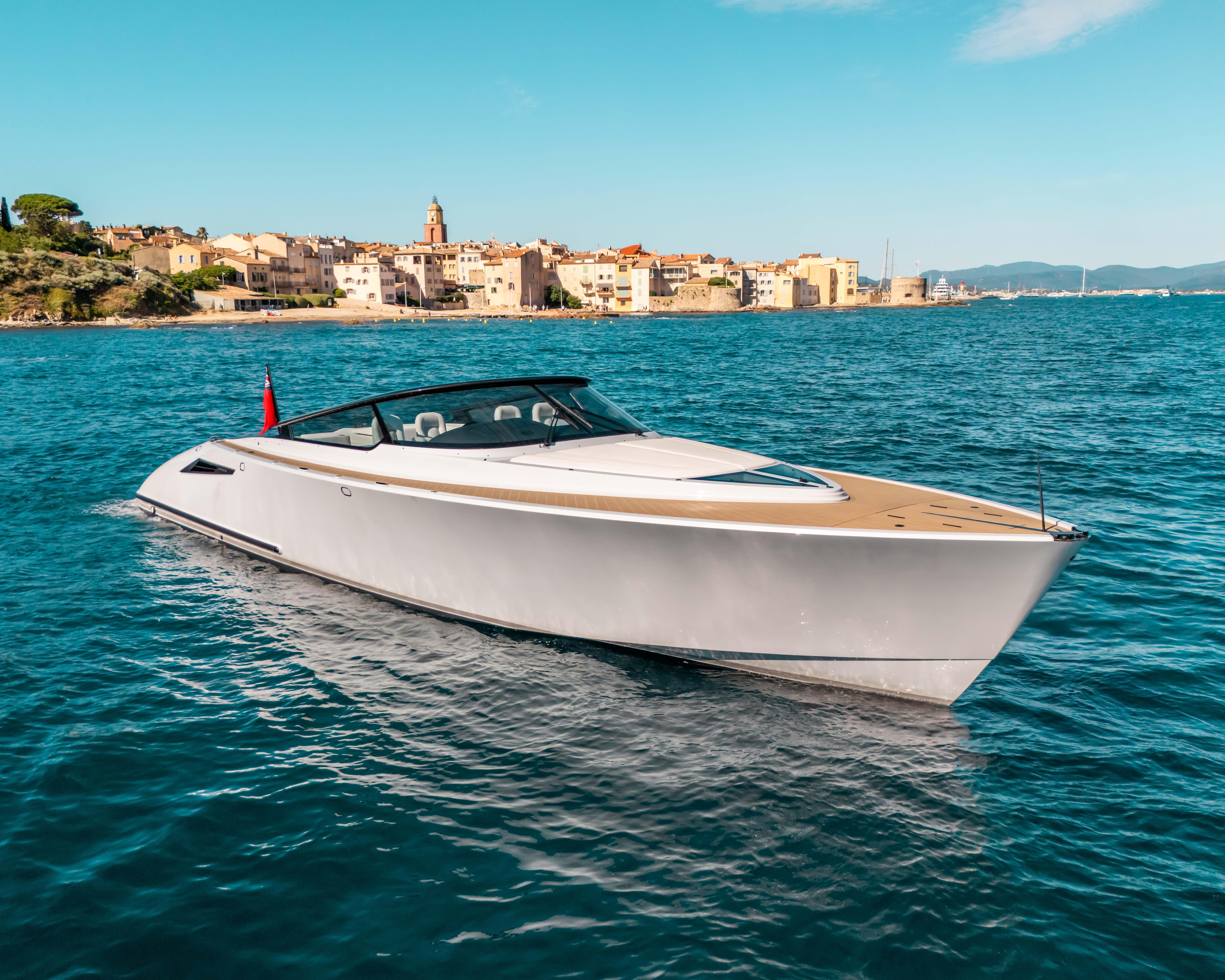 Wajer 55 Luxury 2022 Wajer 55 yacht cruising near a scenic coastal town.