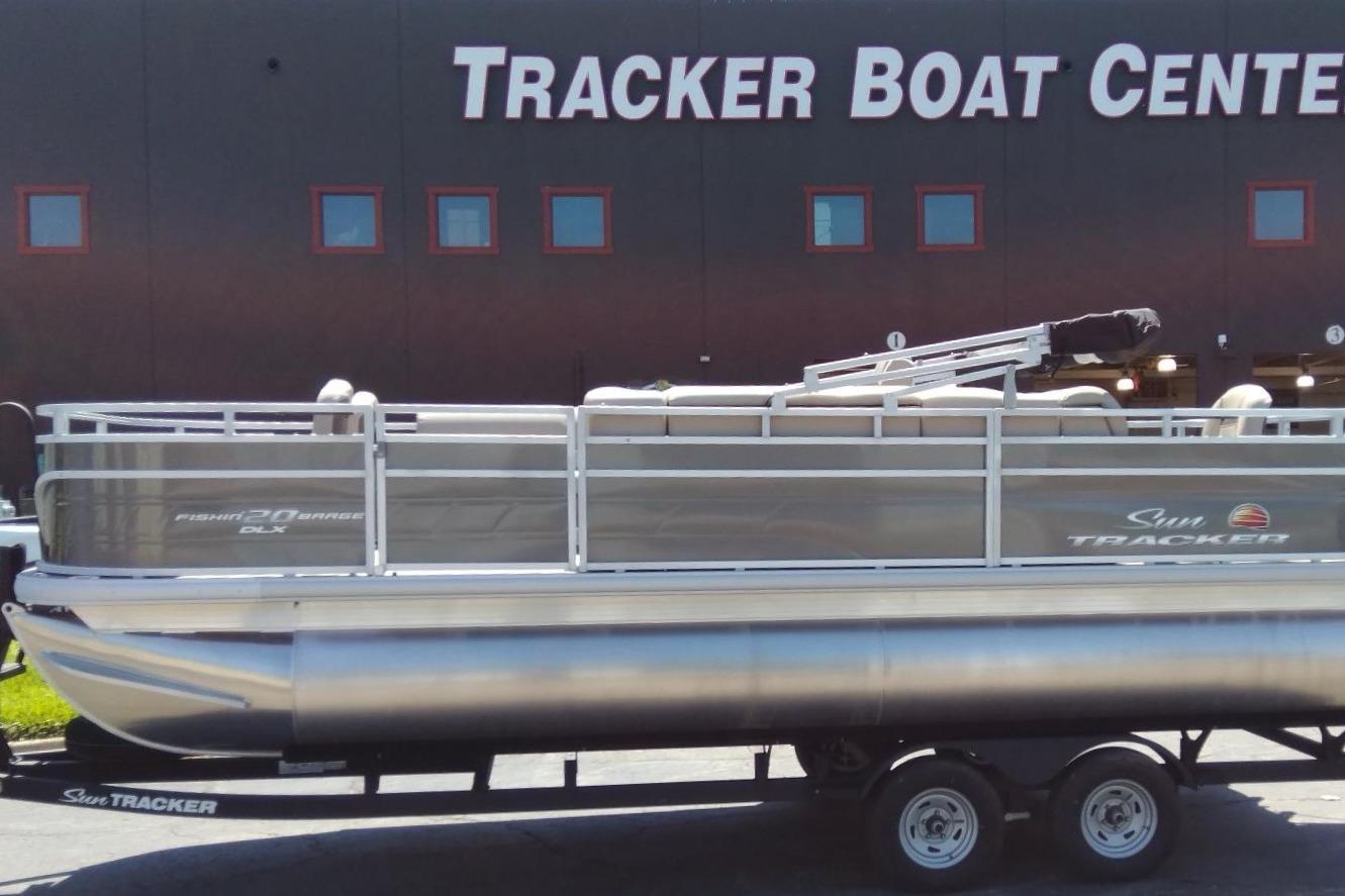 Sun Tracker Fishin' Barge 20 DLX 2025 Sun Tracker Fishin' Barge 20 DLX pontoon boat at Tracker Boat Center.