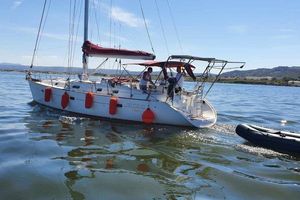 Beneteau Oceanis 411 2001 Beneteau Oceanis 411 sailboat cruising on calm waters under clear skies.