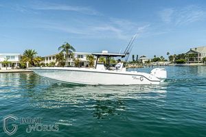 CG Boat Works 35 M-Series 2022 CG Boat Works 35 M-Series cruising on a sunny waterfront.