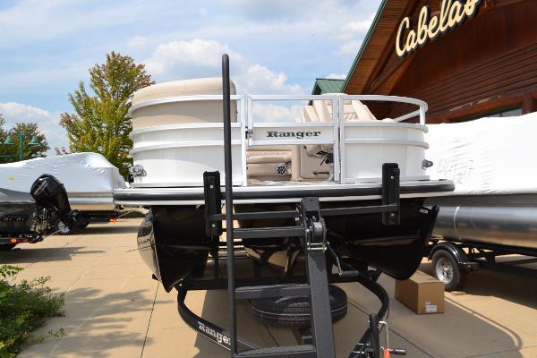 Ranger Reata 223FC 2024 Ranger Reata 223FC pontoon boat displayed outside Cabela's store.