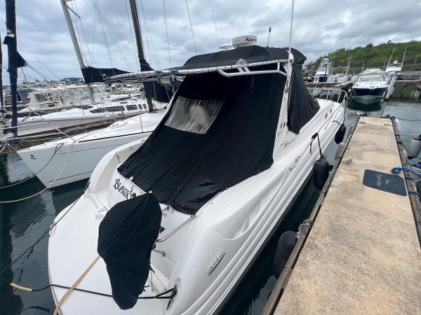 Sea Ray 340 Sundancer 2006 Sea Ray 340 Sundancer docked at marina with black covers.