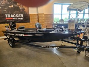Tracker Panfish 17 2025 Tracker Panfish 17 boat displayed indoors with promotional materials.
