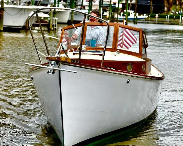 Custom Eldred Cooper 30 Downeast Custom Eldred Cooper 30 Downeast boat, 2008 model, cruising on a calm waterway.