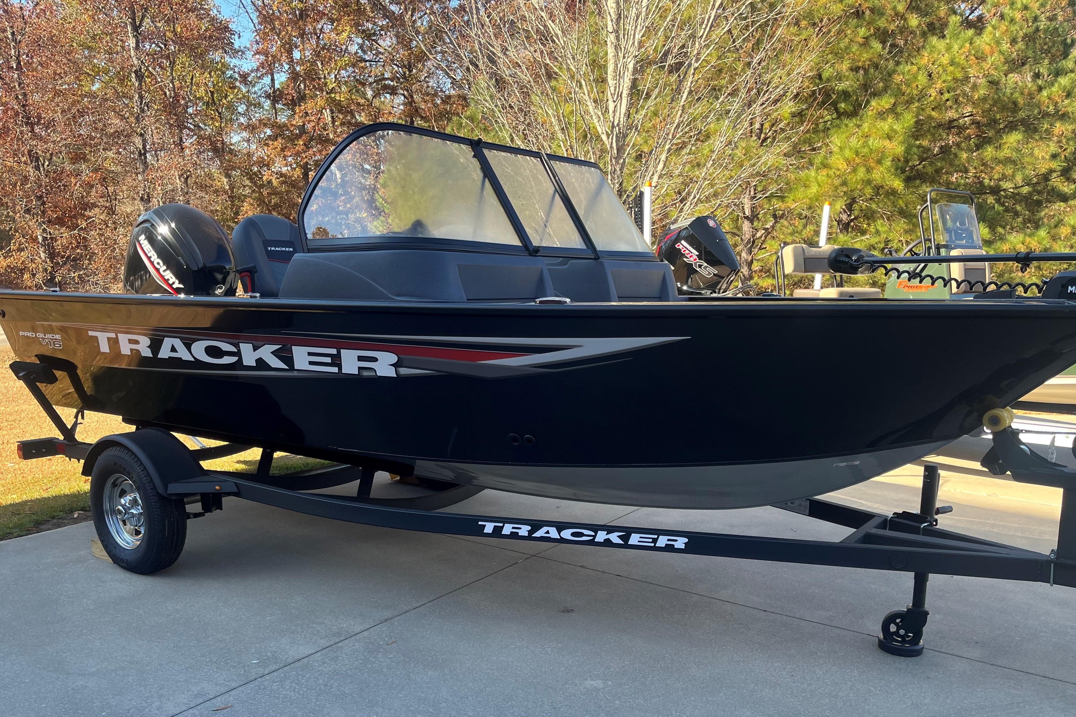 Tracker Pro Guide V-16 WT 2025 Tracker Pro Guide V-16 WT boat on trailer, parked outdoors.