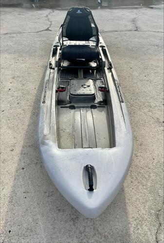 Ascend 128X Yak-Power Sit-On - Desert Storm 2021 Ascend 128X Yak-Power Sit-On kayak in Desert Storm color on concrete surface.