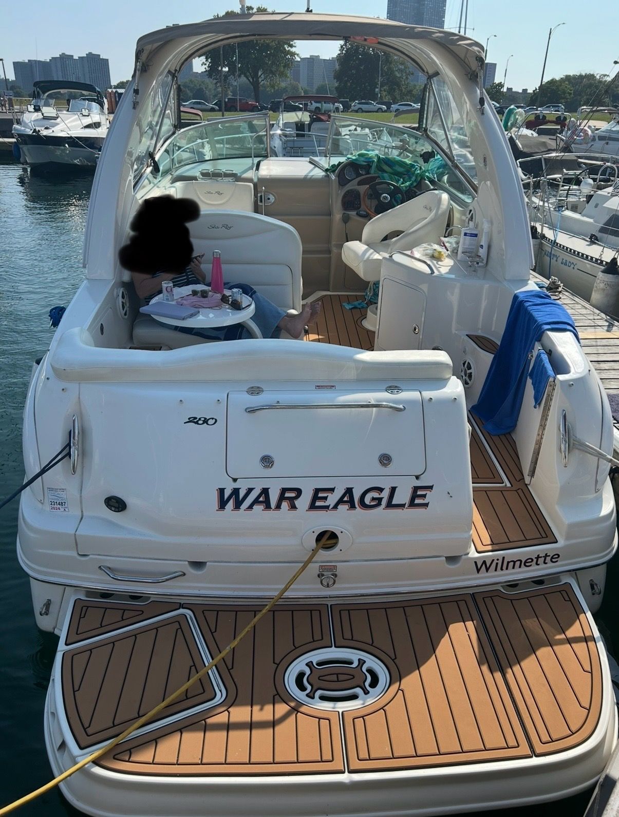 Sea Ray 280 Sundancer 2005 Sea Ray 280 Sundancer boat docked, featuring "War Eagle" name and teak deck.