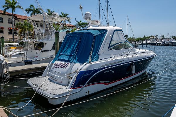 Formula 37 PC 2007 Formula 37 PC yacht docked in marina, featuring sleek design and blue accents.