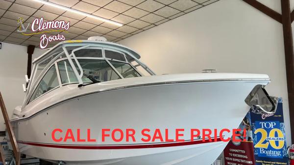 Albemarle 27 Dual Console 2025 Albemarle 27 Dual Console boat displayed indoors, available for sale at Clemons Boats.