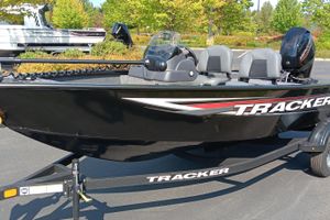 Tracker Super Guide V-16 SC 2026 Tracker Super Guide V-16 SC boat on trailer, parked outdoors.