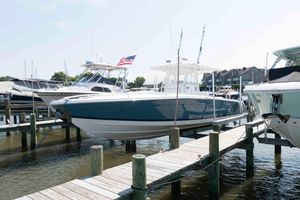 Marlago Fs 35 Center Console Cuddy 2008 Marlago FS 35 Center Console Cuddy docked at marina with American flag.