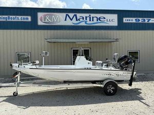 Xpress H190B Bay 2026 Xpress H190B boat on trailer outside L&M Marine LLC building.